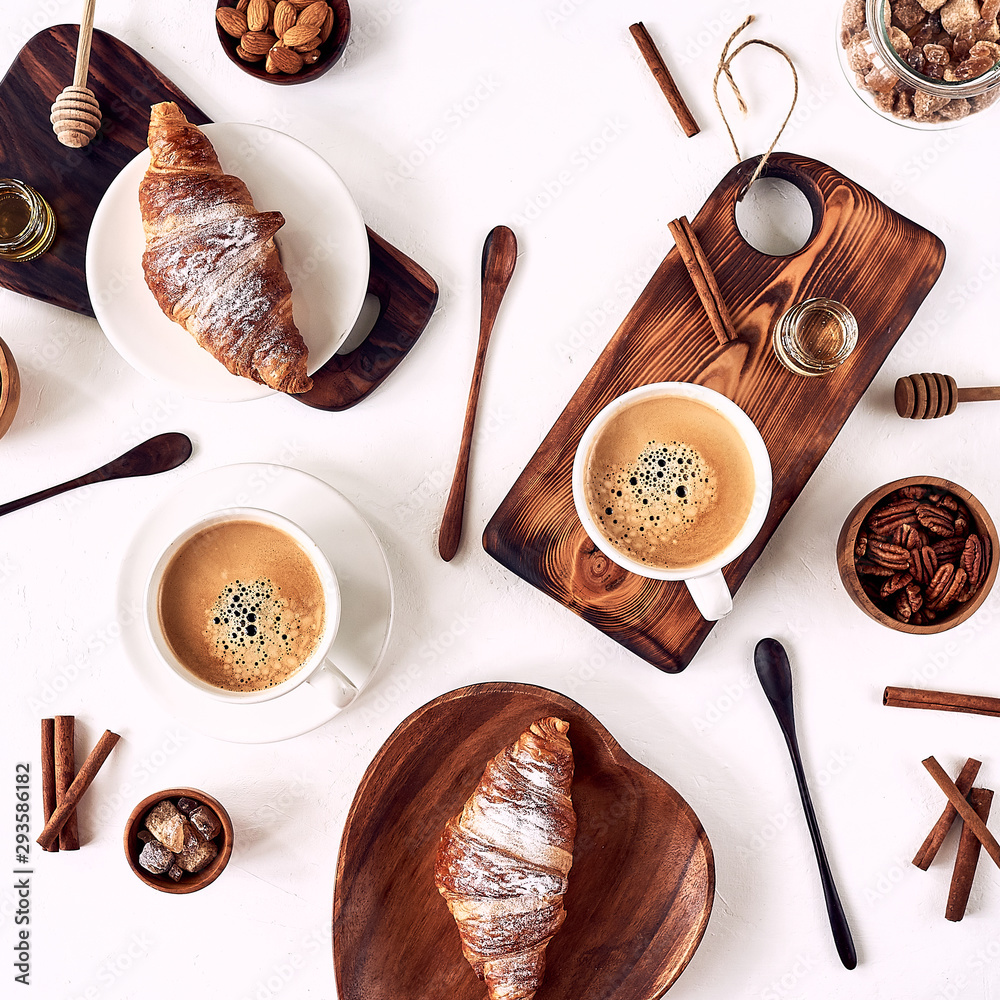 Fototapeta breakfast pattern, croissant, coffee, honey, cinnamon sticks, nuts, sugar. Good morning concept.