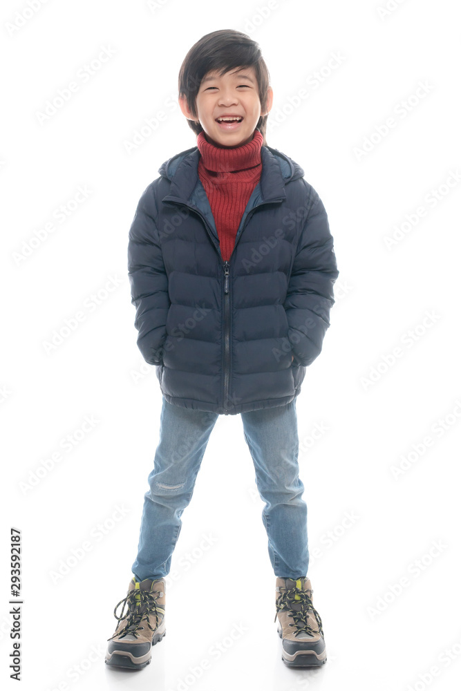 Cute Asian boy in warm clothing on white background.isolated Cute Asian boy in warm clothing on white background.isolated