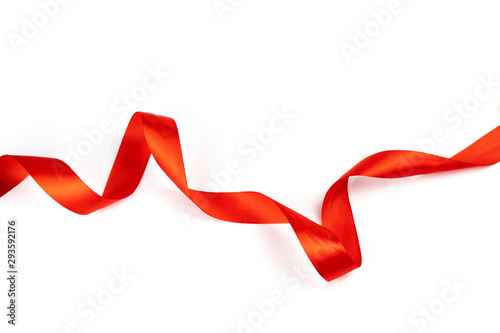 Red silk shiny ribbon isolated on white background.