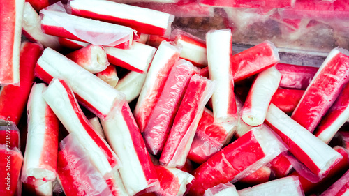 iced crab sticks lay on shop refregirator photo