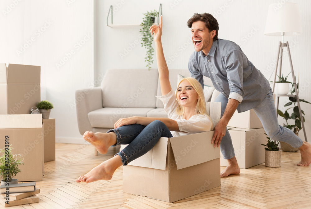 Husband Riding Wife In Box Celebrating Moving Into Own House Husband Riding Wife In Box Celebrating Moving Into Own House