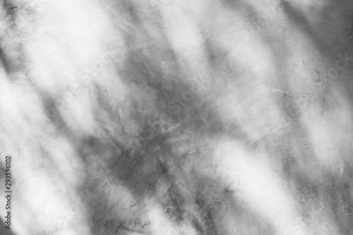 Cement or concrete wall texture and shadow of the sun light for background. Gray backgrounds.