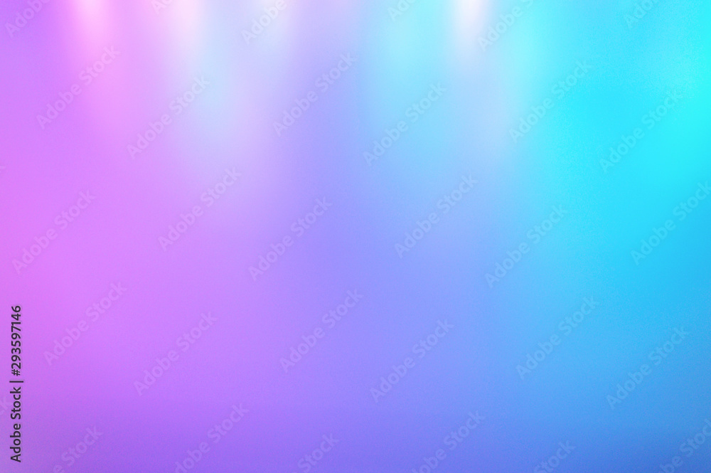 Blurred multicolored background from light. Iridescent holographic abstract soft pastel colors backdrop. 