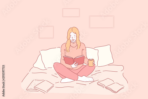 Hobby, leisure, comfort concept. Young happy woman or girl in a good mood reading a book in the cosiness of drinking tea, coffee. Sweet lady is getting ready for the exam, relax at bedroom. Flat