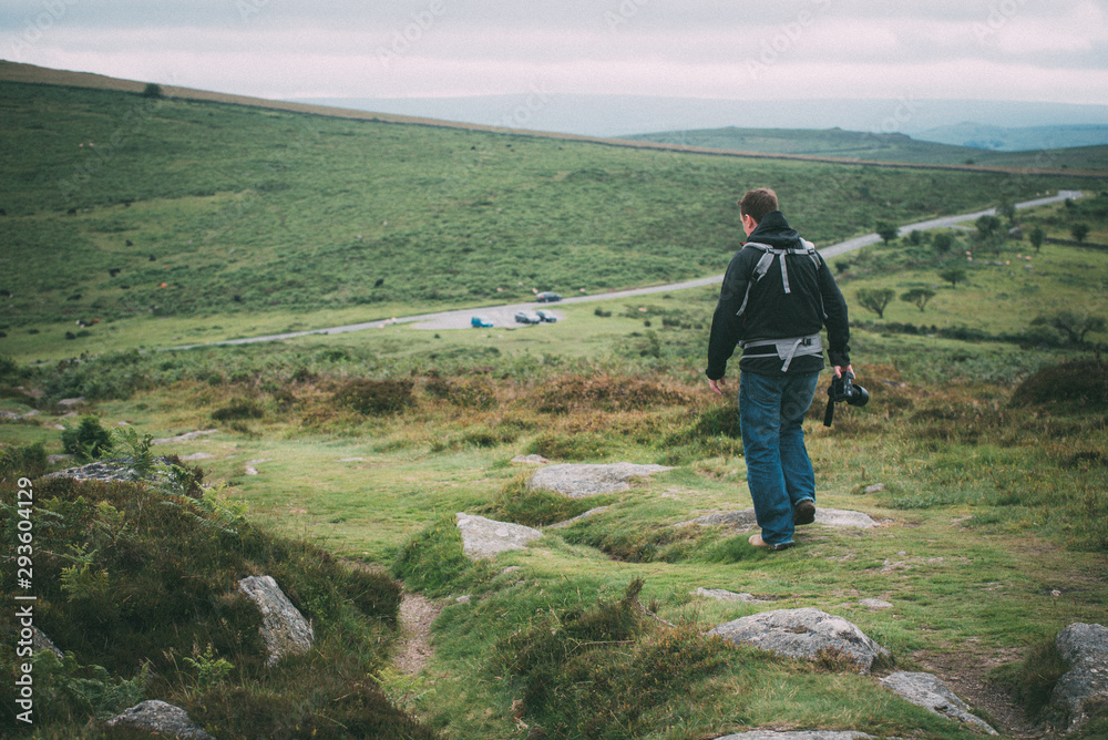 hiker on the top of mountain