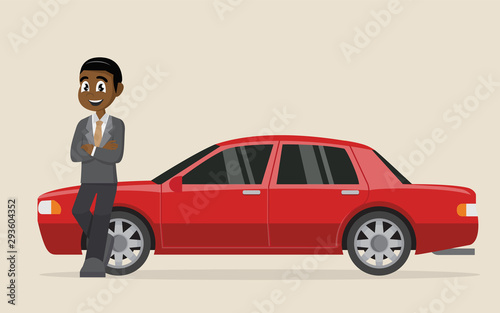 Happy African businessman standing near car.