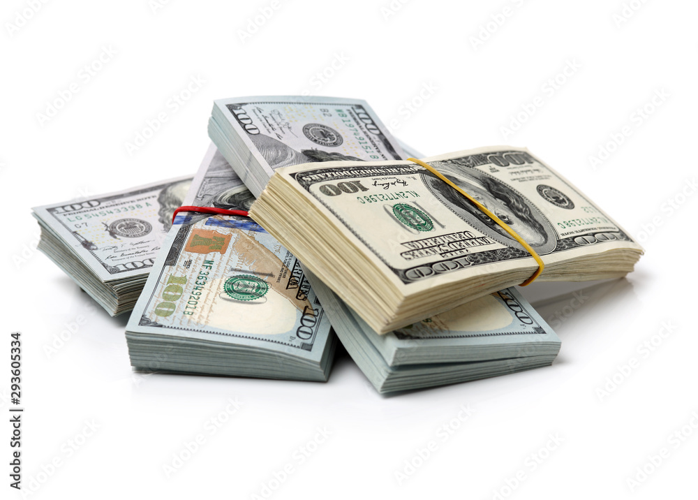 Many bundle of US 100 dollars bank notes isolated on white background Many bundle of US 100 dollars bank notes isolated on white background
