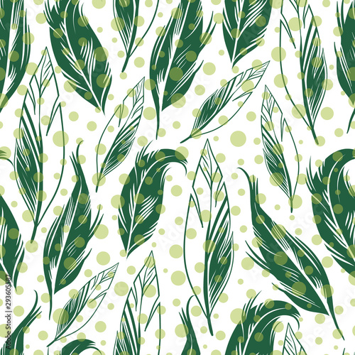 Vector green feather with polka dots seamless