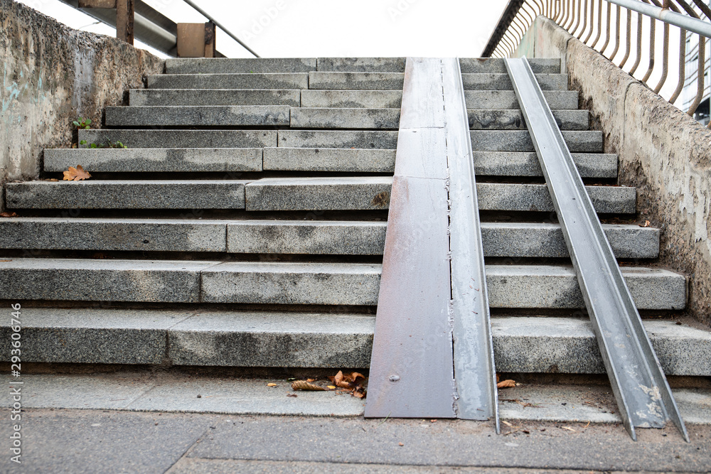 Concrete stairs with descent, view from down to up Concrete stairs with descent, view from down to up