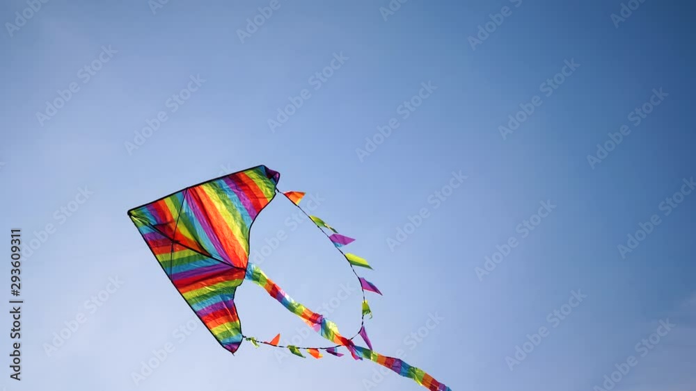 kite on blue sky background. Outdoor entertainment kite on blue sky background. Outdoor entertainment