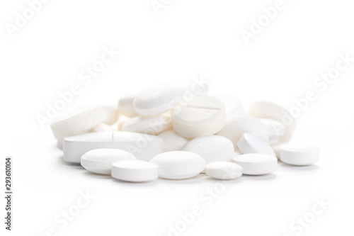 Medical,pharmacy theme background concept. White pills on white background.