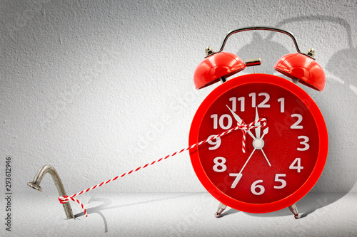 Fotografija Stop time on clock by rope and nail