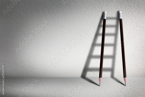 Stairs with pencil for effort and challenge in business to be achievement and successful concept photo