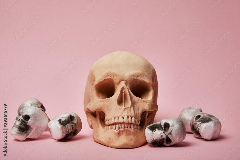 spooky skulls on pink background, Halloween decoration