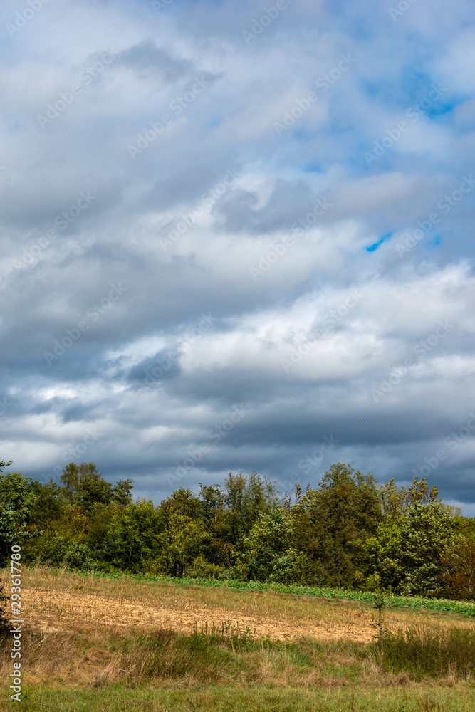 landscape with blue sky and clouds