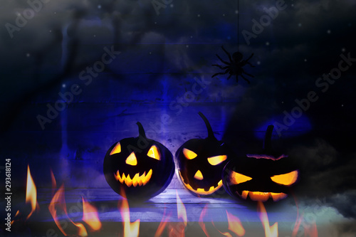 Halloween pumpkin head jack lantern in dark background