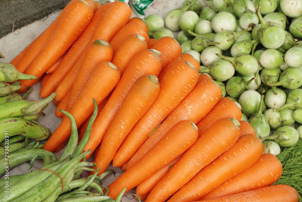 Fresh organic carrots for cooking in market