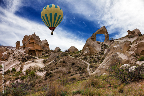 Hot air balloon in Cappadocia rock landscape view, Turkey. Volcanic mountains, Anatolia, Goreme national park.