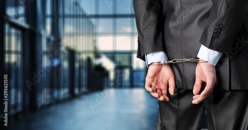 Arrest bound bracelet bribe bribery business businessman photo