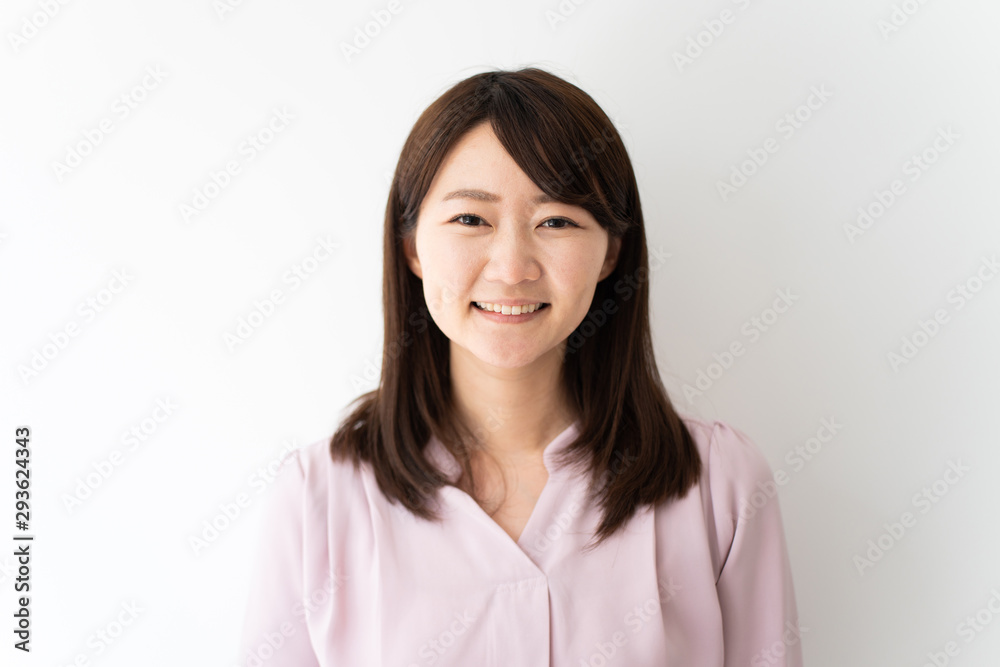 Young business woman against white background