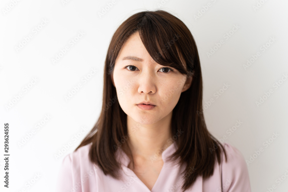 Angry business woman against white background Angry business woman against white background