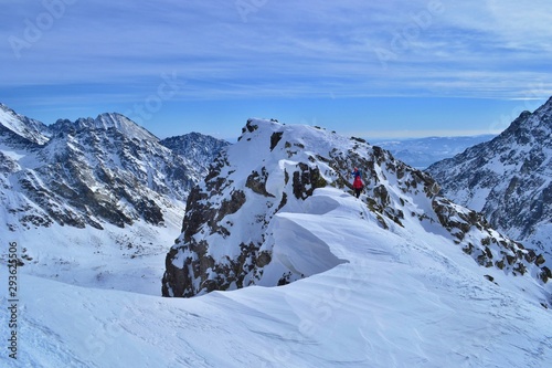 Tatra mountains, Slovakia - FEBRUARY 23, 2019: A group of friends is climbing to the summit of Koprovsky Stit. Rising through the snow with cats and wands high in the mountains.