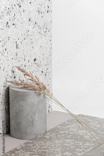 Creative composition of various building decoration materials and dry plants.