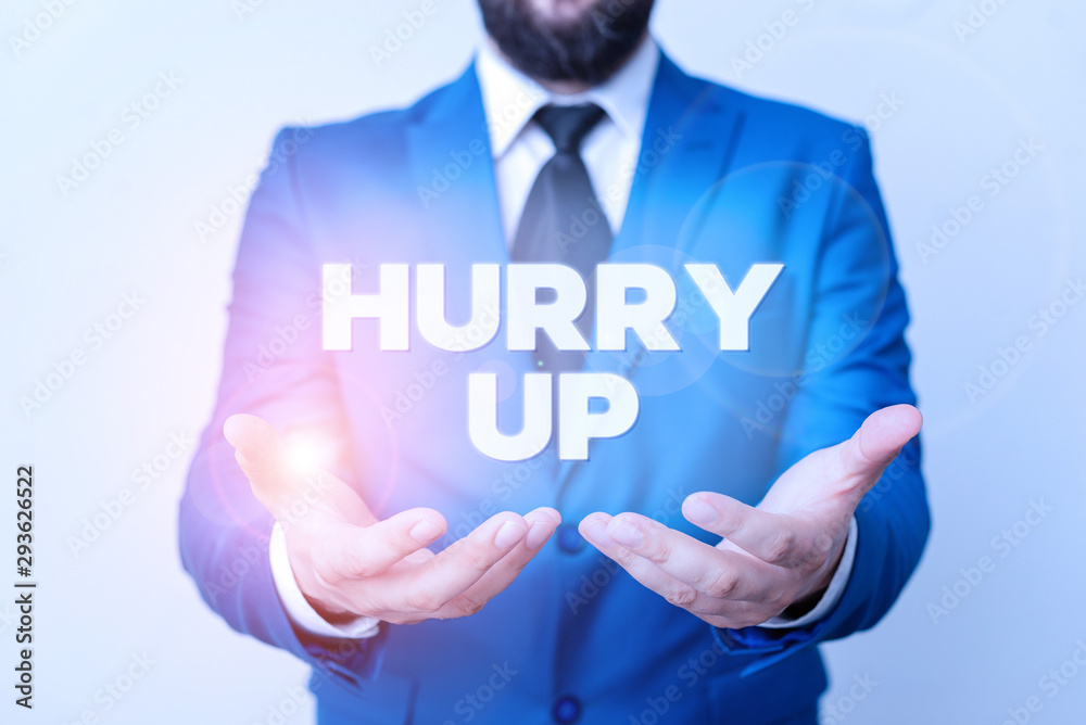 Text sign showing Hurry Up. Business photo showcasing asking someone to do a job very fast Quickly Lets go Encourage Man with opened hands in fron of the table. Mobile phone and notes on the table Text sign showing Hurry Up. Business photo showcasing asking someone to do a job very fast Quickly Lets go Encourage Man with opened hands in fron of the table. Mobile phone and notes on the table