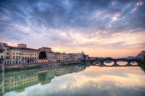 Sunset over the Arno river in Florence with Ponte Vecchio