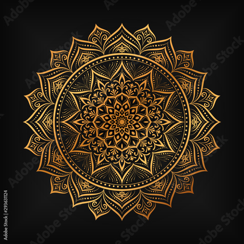 luxury ornamental mandala design background in gold color