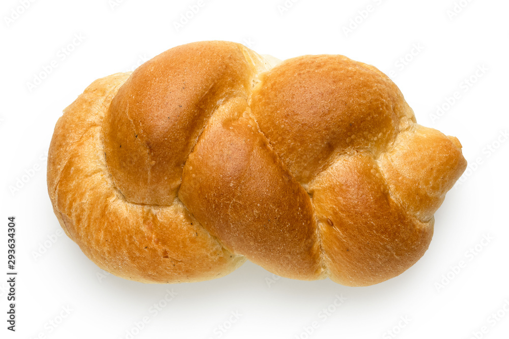 Plaited plain white bread roll isolated on white. Top view.