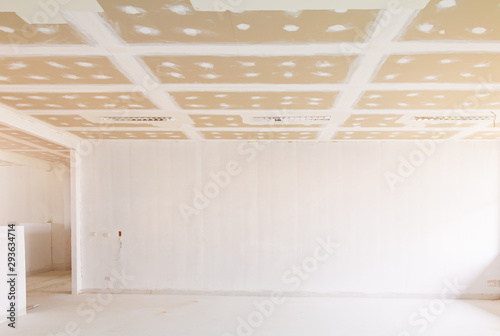 gypsum board ceiling structure and plaster mortar wall painted foundation white decorate interior room in building construction site