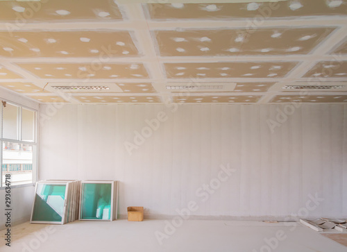 Valokuva gypsum board ceiling structure and plaster mortar wall painted foundation white