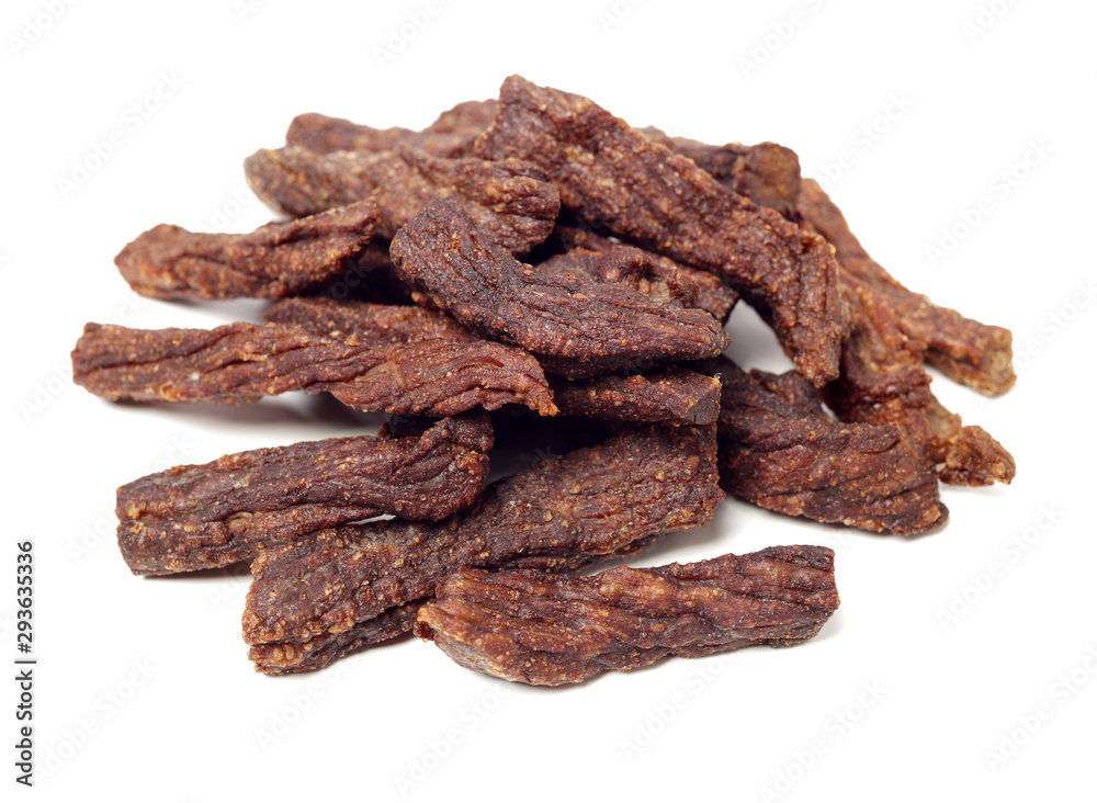 Fototapeta premium Slices of beef jerky on white background