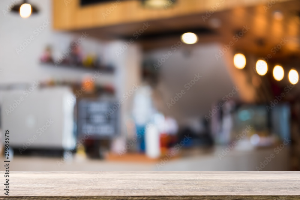 Empty wooden table and blurred cafe background, can be used for display or montage your products