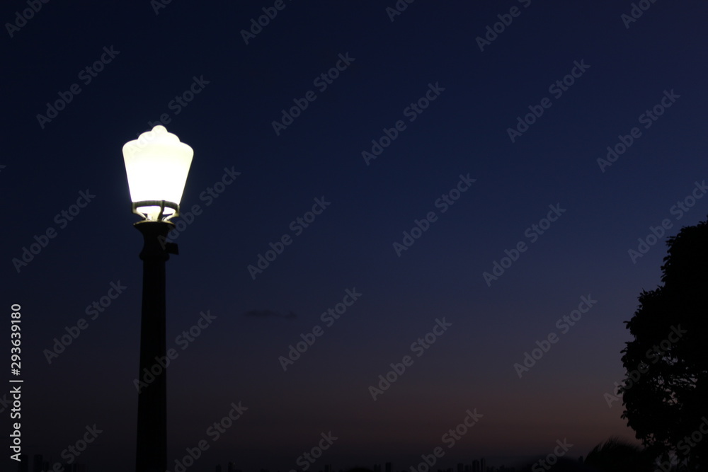 street lamp on the background of blue sky