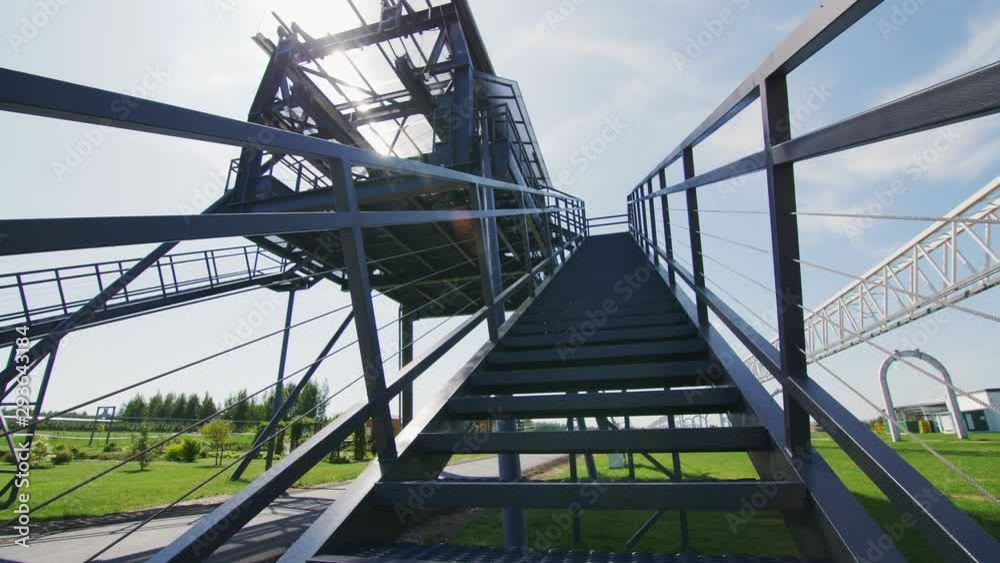 going up stairs to overpass station for string transport going up stairs to overpass station for string transport