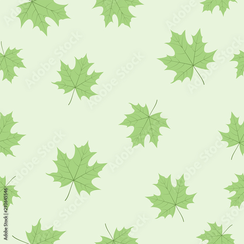 The seamless pattern with maple leaves is on the green background.