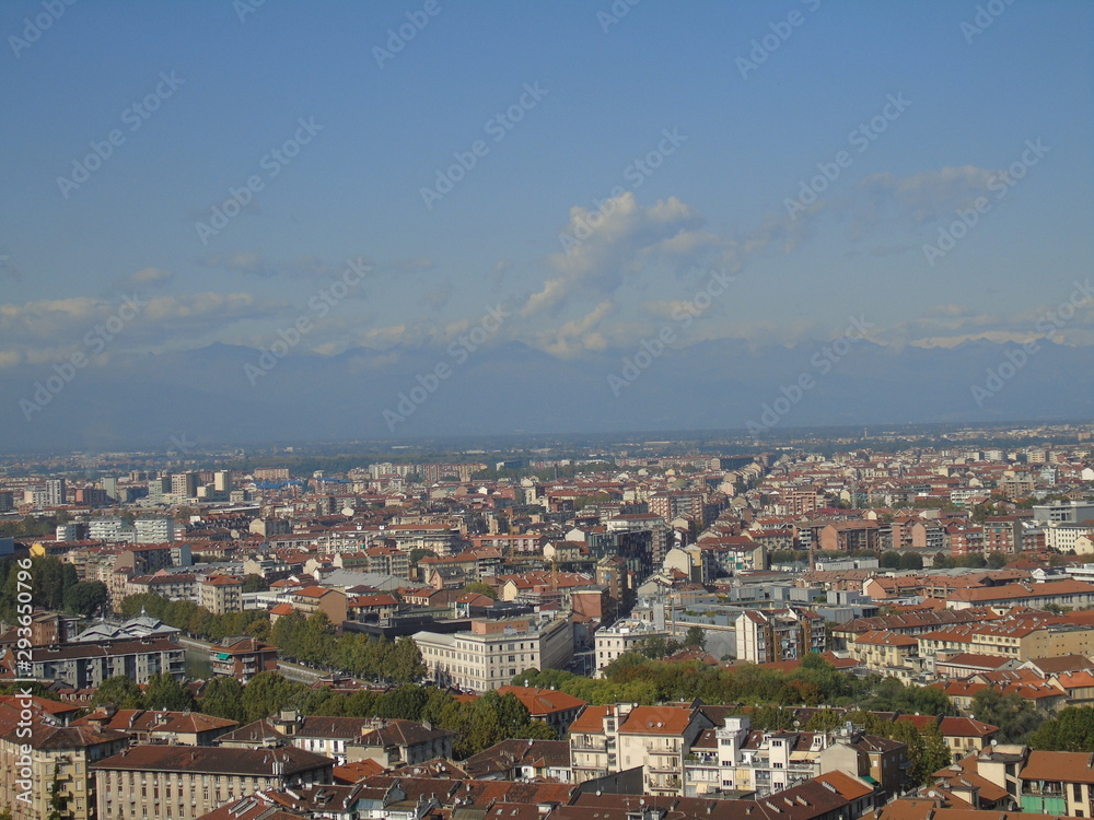 Turin, Italy - 10/02/2019: Travelling around North Italy. Beautiful caption of Turin wih sunny days and blue sky. Panoramic view to the city from Mole Antoneliana. Detailed photography of the old arch Turin, Italy - 10/02/2019: Travelling around North Italy. Beautiful caption of Turin wih sunny days and blue sky. Panoramic view to the city from Mole Antoneliana. Detailed photography of the old arch