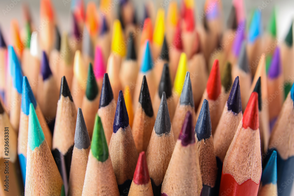Different color pencils as background, closeup view