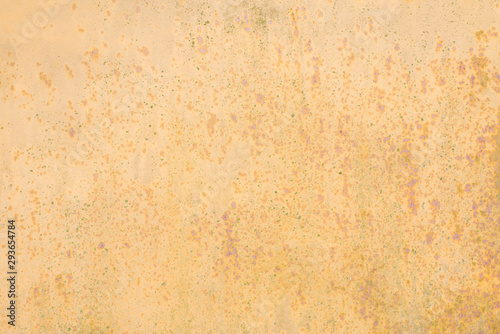 Yellow beige background putty on the wall