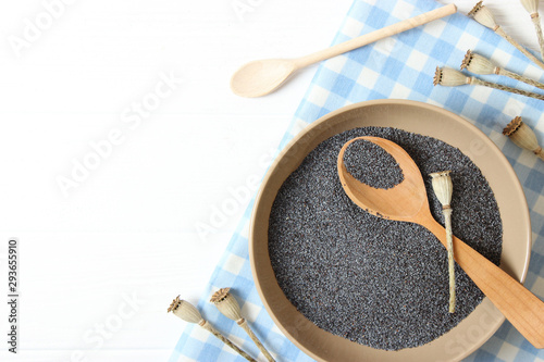 poppy seeds in a bowl on a table