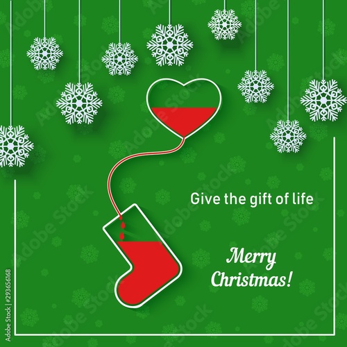 Red drops of blood flow from the heart into a vessel in the shape of a Christmas sock with snowflakes on rope.. Vector Thank you card in paper cut style. Blood transfusion creative poster concept.