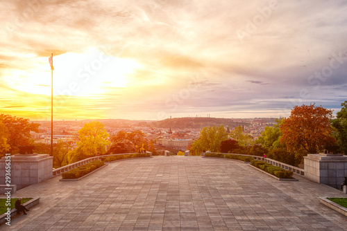 Photography Sunset view of Prague from Vitkov hill with autumn park, scenic sunny cytiscape,