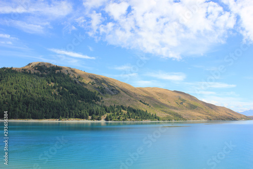 glassy lake pukaki on a beautiful sunny day