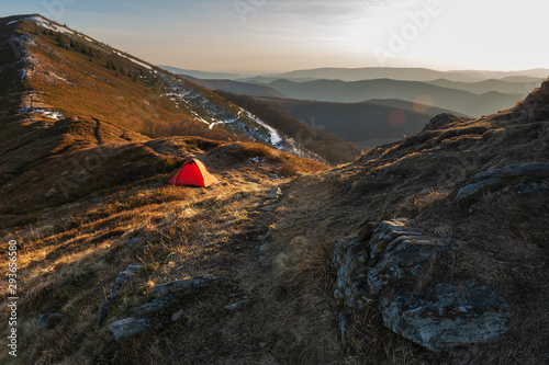 Fantastic views of the evening and morning mountain ridge with tourists and tents