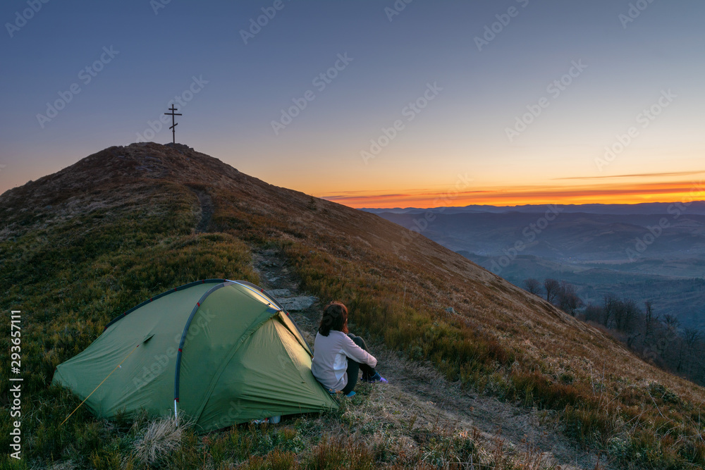 Fantastic views of the evening and morning mountain ridge with tourists and tents