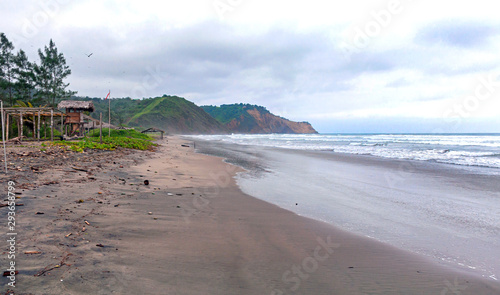 Lateral view of the Ayampe fishing beach, early in the morning on an overcast day. Ayampe, Manabi, Ecuador photo