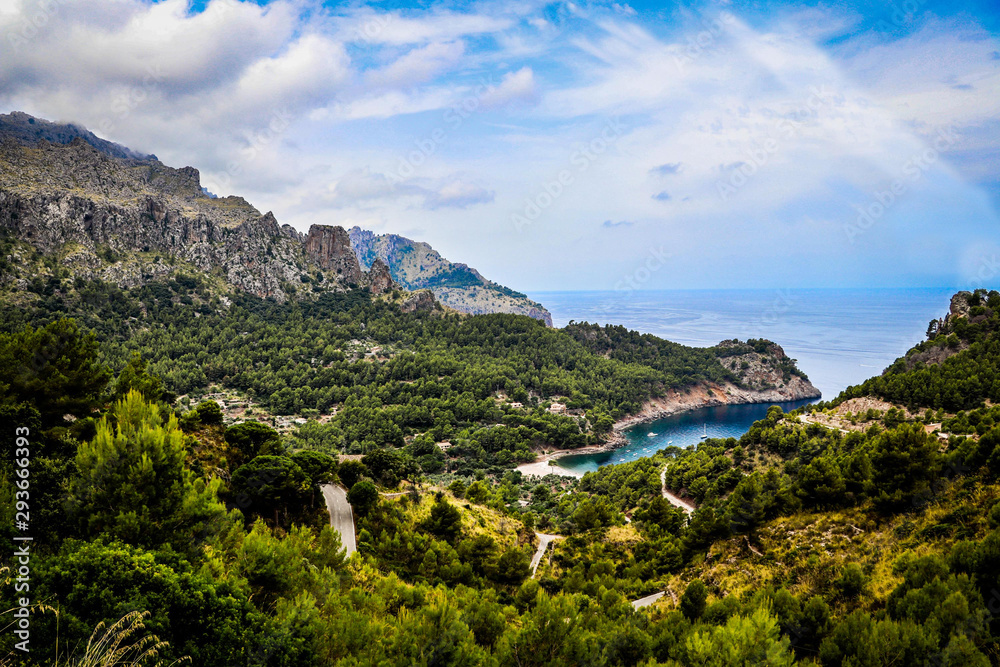 Landscape view of a blue lagoon from the mountains in Mallorca 