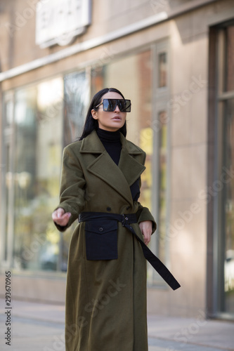 fashion brunette in the city. photo